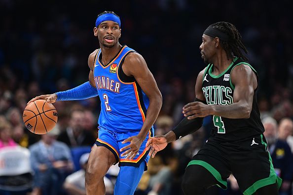 OKLAHOMA CITY, OKLAHOMA - JANUARY 2: Shai Gilgeous-Alexander #2 of the Oklahoma City Thunder handles the ball during the second half against the Boston Celtics at Paycom Center on January 2, 2024 in Oklahoma City, Oklahoma. NOTE TO USER: User expressly acknowledges and agrees that, by downloading and or using this Photograph, user is consenting to the terms and conditions of the Getty Images License Agreement. (Photo by Joshua Gateley/Getty Images)