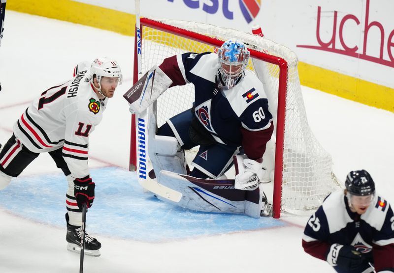 Mar 4, 2024; Denver, Colorado, USA; Colorado Avalanche goaltender Justus Annunen (60) defends his net in the first period against the Chicago Blackhawks at Ball Arena. Mandatory Credit: Ron Chenoy-USA TODAY Sports