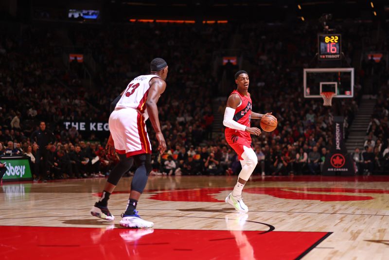 TORONTO, CANADA - JANUARY 17: RJ Barrett #9 of the Toronto Raptors dribbles the ball during the game against the Miami Heat on January 17, 2024 at the Scotiabank Arena in Toronto, Ontario, Canada.  NOTE TO USER: User expressly acknowledges and agrees that, by downloading and or using this Photograph, user is consenting to the terms and conditions of the Getty Images License Agreement.  Mandatory Copyright Notice: Copyright 2024 NBAE (Photo by Vaughn Ridley/NBAE via Getty Images)