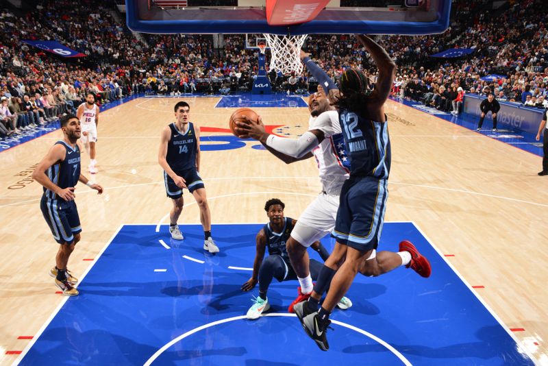 PHILADELPHIA, PA - NOVEMBER 2: Andre Drummond #5 of the Philadelphia 76ers drives to the basket during the game against the Memphis Grizzlies on November 2, 2024 at the Wells Fargo Center in Philadelphia, Pennsylvania NOTE TO USER: User expressly acknowledges and agrees that, by downloading and/or using this Photograph, user is consenting to the terms and conditions of the Getty Images License Agreement. Mandatory Copyright Notice: Copyright 2024 NBAE (Photo by Jesse D. Garrabrant/NBAE via Getty Images)