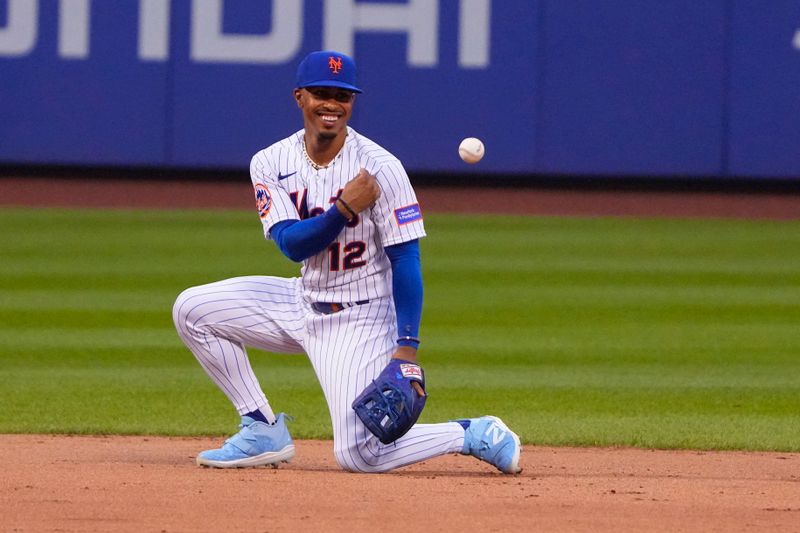 Jul 2, 2023; New York City, New York, USA;New York Mets shotstop Francisco Lindor (12) reacts after catching a line drive against the San Francisco Gianes during the third inning at Citi Field. Mandatory Credit: Gregory Fisher-USA TODAY Sports