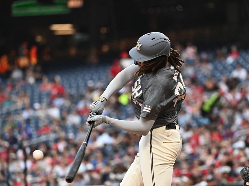 Aug 10, 2024; Washington, District of Columbia, USA;  Washington Nationals left fielder James Wood (29) hits a home run during the second inning against the Los Angeles Angels at Nationals Park. Mandatory Credit: James A. Pittman-USA TODAY Sports