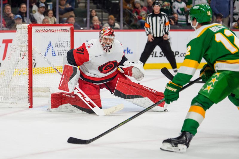 Nov 19, 2025; Saint Paul, Minnesota, USA; Carolina Hurricanes goaltender Frederik Andersen (31) watches Minnesota Wild left wing Matt Boldy (12) come in for the shot in the overtime at Grand Casino Arena. Mandatory Credit: Matt Blewett-Imagn Images