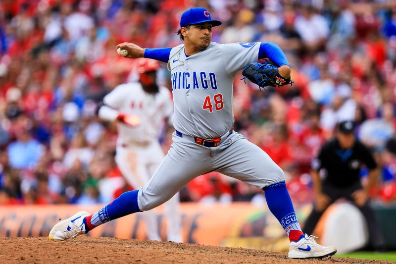 May 25, 2025; Cincinnati, Ohio, USA; Chicago Cubs relief pitcher Daniel Palencia (48) pitches against the Cincinnati Reds in the ninth inning at Great American Ball Park. Mandatory Credit: Katie Stratman-Imagn Images