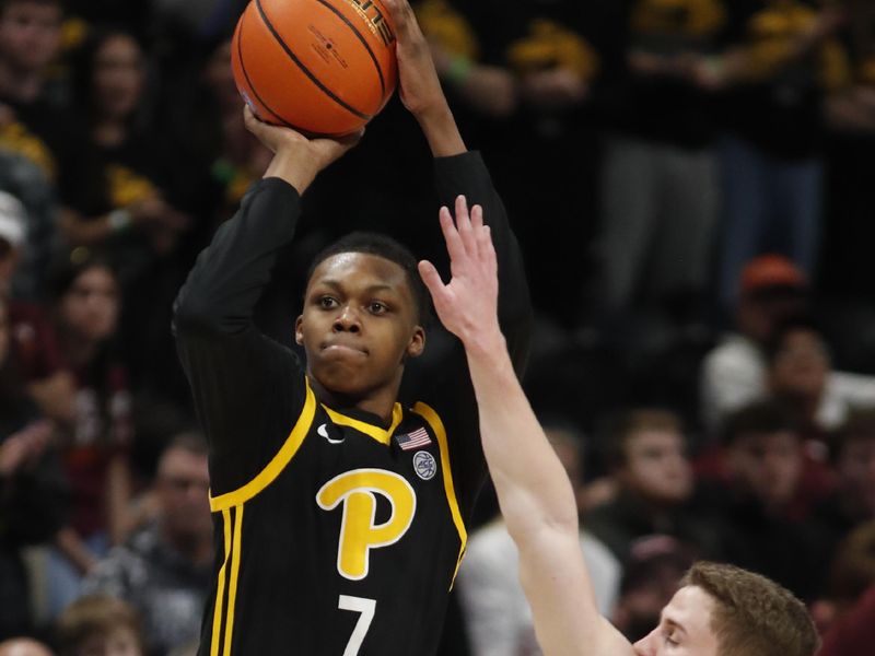 Feb 24, 2024; Pittsburgh, Pennsylvania, USA;  Pittsburgh Panthers guard Carlton Carrington (7) shoots the ball against Virginia Tech Hokies guard Sean Pedulla (3) during the second half at the Petersen Events Center. The Panthers won 79-64. Mandatory Credit: Charles LeClaire-USA TODAY Sports