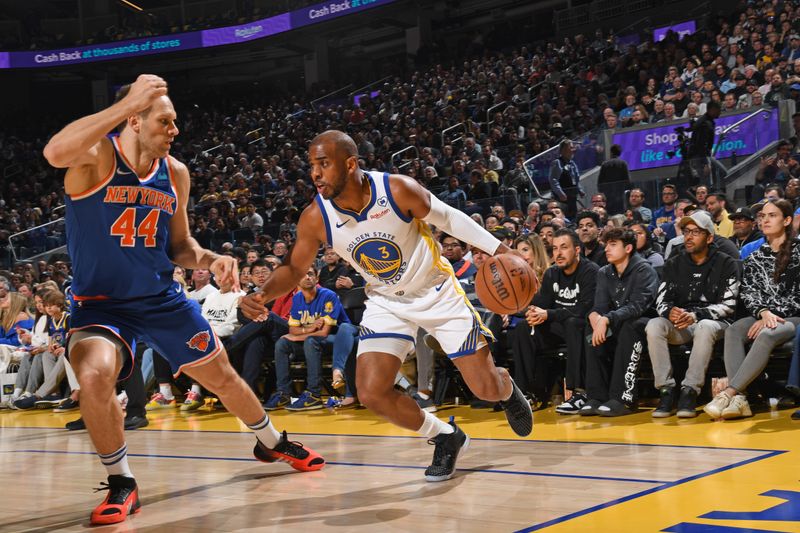 SAN FRANCISCO, CA - MARCH 18: Chris Paul #3 of the Golden State Warriors dribbles the ball during the game against the New York Knicks on MARCH 18, 2024 at Chase Center in San Francisco, California. NOTE TO USER: User expressly acknowledges and agrees that, by downloading and or using this photograph, user is consenting to the terms and conditions of Getty Images License Agreement. Mandatory Copyright Notice: Copyright 2024 NBAE (Photo by Noah Graham/NBAE via Getty Images)