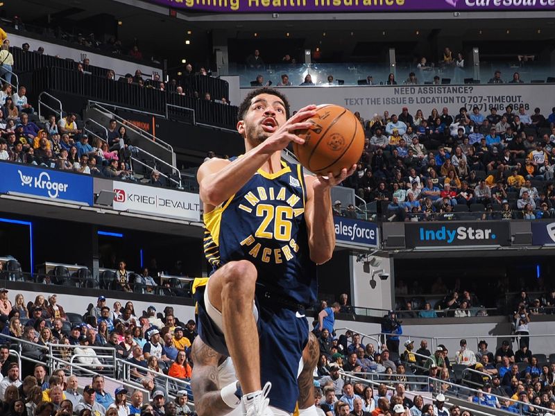 INDIANAPOLIS, IN - MARCH 19:  Ben Sheppard #26 of the Indiana Pacers drives to the basket during the game against the Denver Nuggets on March 19, 2025 at Gainbridge Fieldhouse in Indianapolis, Indiana. NOTE TO USER: User expressly acknowledges and agrees that, by downloading and or using this Photograph, user is consenting to the terms and conditions of the Getty Images License Agreement. Mandatory Copyright Notice: Copyright 2025 NBAE (Photo by Ron Hoskins/NBAE via Getty Images)