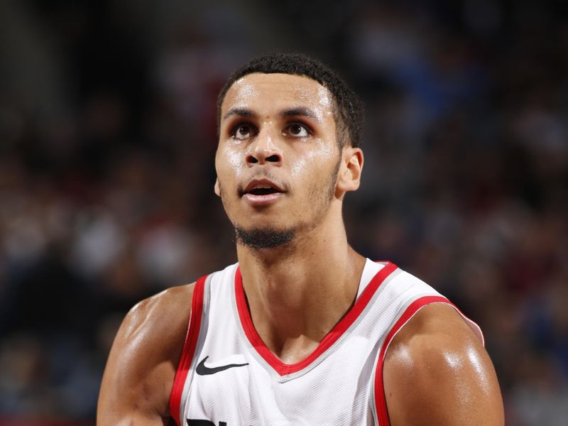 PORTLAND, OR - APRIL 11:  Kris Murray #8 of the Portland Trail Blazers shoots a free throw during the game on April 11, 2024 at the Moda Center Arena in Portland, Oregon. NOTE TO USER: User expressly acknowledges and agrees that, by downloading and or using this photograph, user is consenting to the terms and conditions of the Getty Images License Agreement. Mandatory Copyright Notice: Copyright 2024 NBAE (Photo by Cameron Browne/NBAE via Getty Images)