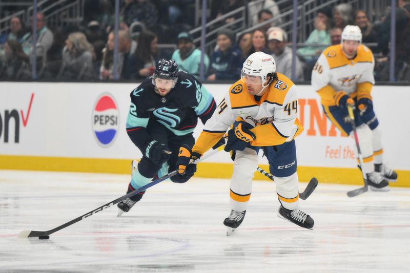 Mar 16, 2024; Seattle, Washington, USA; Nashville Predators left wing Kiefer Sherwood (44) plays the puck against the Seattle Kraken during the first period at Climate Pledge Arena. Mandatory Credit: Steven Bisig-USA TODAY Sports