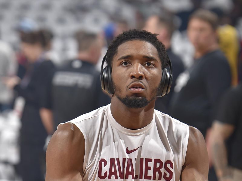 CLEVELAND, OH - APRIL 15: Donovan Mitchell #45 of the Cleveland Cavaliers warms up before the game against the New York Knicks during the 2023 Round 1 Game 1 NBA Playoffs on April 15, 2023 at Rocket Mortgage FieldHouse in Cleveland, Ohio. NOTE TO USER: User expressly acknowledges and agrees that, by downloading and/or using this Photograph, user is consenting to the terms and conditions of the Getty Images License Agreement. Mandatory Copyright Notice: Copyright 2023 NBAE (Photo by David Liam Kyle/NBAE via Getty Images)