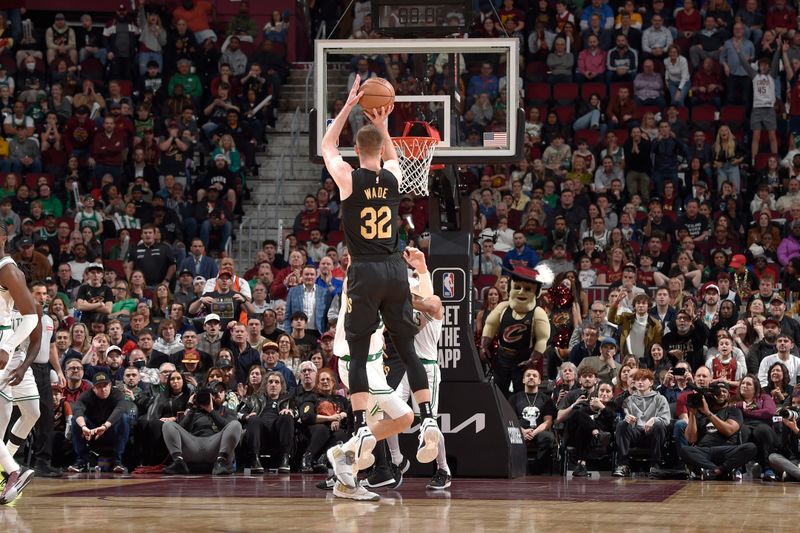 CLEVELAND, OH - MARCH 5: Dean Wade #32 of the Cleveland Cavaliers shoots the ball during the game against the Boston Celtics on March 5, 2024 at Rocket Mortgage FieldHouse in Cleveland, Ohio. NOTE TO USER: User expressly acknowledges and agrees that, by downloading and/or using this Photograph, user is consenting to the terms and conditions of the Getty Images License Agreement. Mandatory Copyright Notice: Copyright 2024 NBAE (Photo by David Liam Kyle/NBAE via Getty Images)