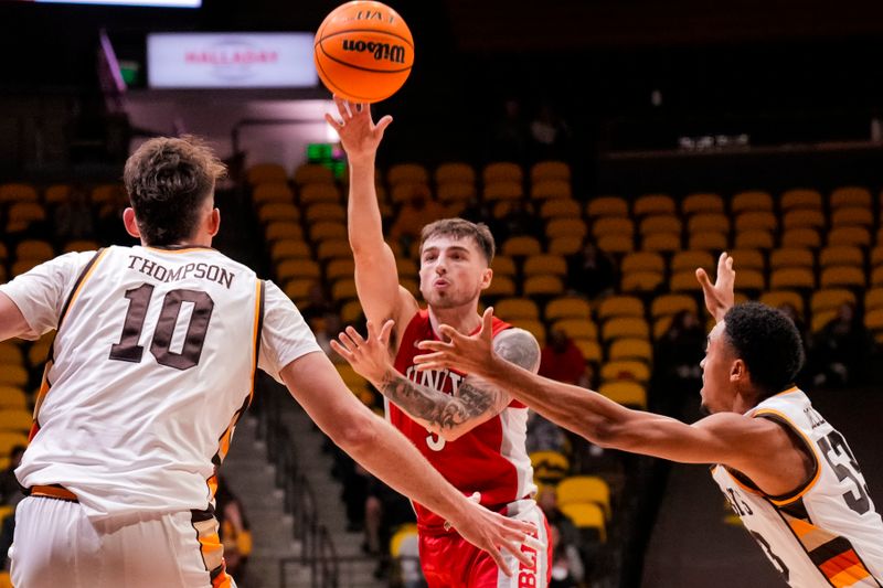 Feb 8, 2023; Laramie, Wyoming, USA; UNLV Runnin' Rebels guard Jordan McCabe (5) looks to pass against the Wyoming Cowboys during the second half at Arena-Auditorium. Mandatory Credit: Troy Babbitt-USA TODAY Sports