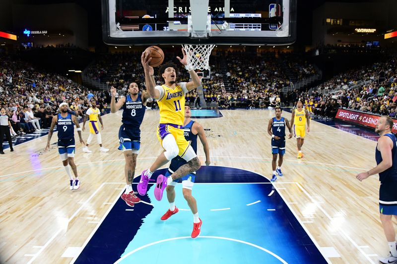 PALM SPRINGS, CA - OCTOBER 4: Jaxson Hayes #11 of the Los Angeles Lakers drives to the basket during the game against the Minnesota Timberwolves during an NBA preseason game on October 4, 2024 at Acrisure Arena in Palm Springs, California. NOTE TO USER: User expressly acknowledges and agrees that, by downloading and/or using this Photograph, user is consenting to the terms and conditions of the Getty Images License Agreement. Mandatory Copyright Notice: Copyright 2024 NBAE (Photo by Adam Pantozzi/NBAE via Getty Images)