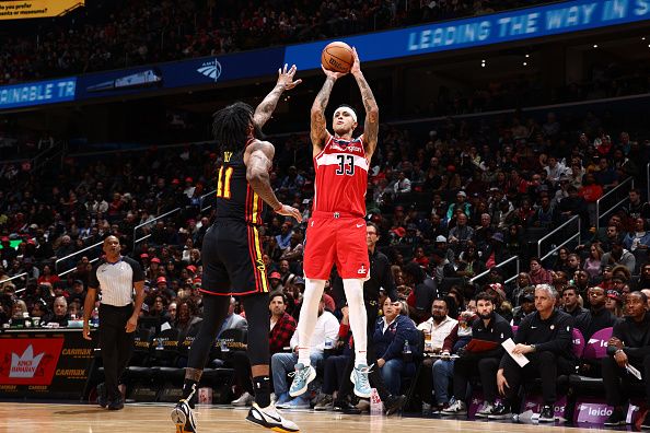 WASHINGTON, DC -? DECEMBER 31: Kyle Kuzma #33 of the Washington Wizards shoots the ball during the game against the Atlanta Hawks on December 31, 2023 at Capital One Arena in Washington, DC. NOTE TO USER: User expressly acknowledges and agrees that, by downloading and or using this Photograph, user is consenting to the terms and conditions of the Getty Images License Agreement. Mandatory Copyright Notice: Copyright 2023 NBAE (Photo by Kenny Giarla/NBAE via Getty Images)