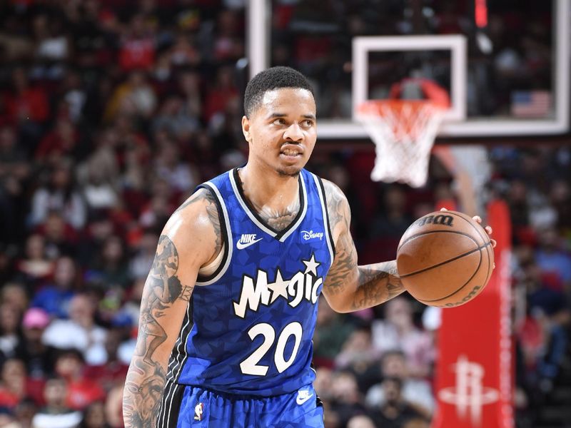 HOUSTON, TX - APRIL 9: Markelle Fultz #20 of the Orlando Magic handles the ball during the game against the Houston Rockets on April 9, 2024 at the Toyota Center in Houston, Texas. NOTE TO USER: User expressly acknowledges and agrees that, by downloading and or using this photograph, User is consenting to the terms and conditions of the Getty Images License Agreement. Mandatory Copyright Notice: Copyright 2024 NBAE (Photo by Logan Riely/NBAE via Getty Images)