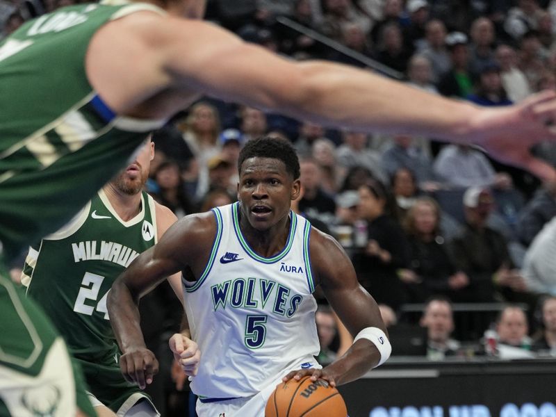 MINNEAPOLIS, MN -  FEBRUARY 23: Anthony Edwards #5 of the Minnesota Timberwolves dribbles the ball during the game against the Milwaukee Bucks on February 23, 2024 at Target Center in Minneapolis, Minnesota. NOTE TO USER: User expressly acknowledges and agrees that, by downloading and or using this Photograph, user is consenting to the terms and conditions of the Getty Images License Agreement. Mandatory Copyright Notice: Copyright 2024 NBAE (Photo by Jordan Johnson/NBAE via Getty Images)