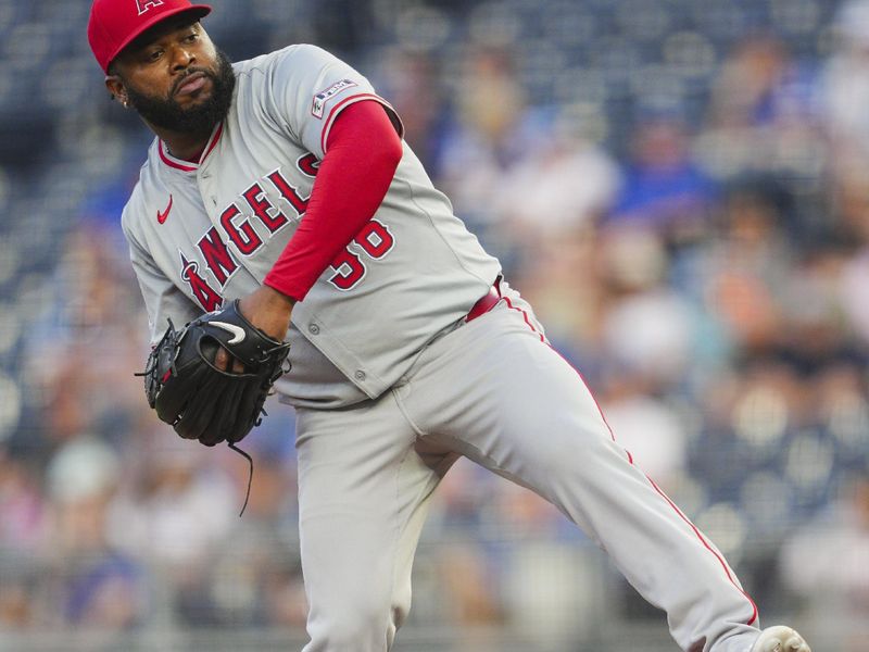 Aug 21, 2024; Kansas City, Missouri, USA; Los Angeles Angels starting pitcher Johnny Cueto (36) loses his balance while pitching during the second inning against the Kansas City Royals at Kauffman Stadium. Mandatory Credit: Jay Biggerstaff-USA TODAY Sports