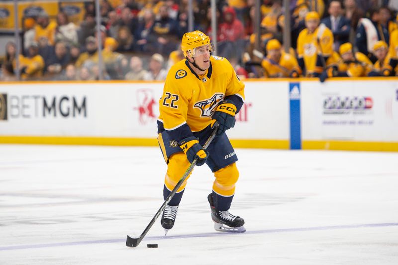 Feb 13, 2024; Nashville, Tennessee, USA;  Nashville Predators defenseman Tyson Barrie (22) skates against the New Jersey Devils during the first period at Bridgestone Arena. Mandatory Credit: Steve Roberts-USA TODAY Sports