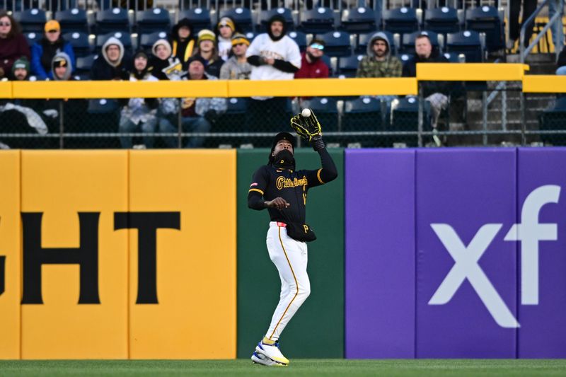 Apr 8, 2025; Pittsburgh, Pennsylvania, USA; Pittsburgh Pirates outfielder Oneil Cruz (15) catches the ball during the fourth inning against the St. Louis Cardinals at PNC Park. Mandatory Credit: David Dermer-Imagn Images