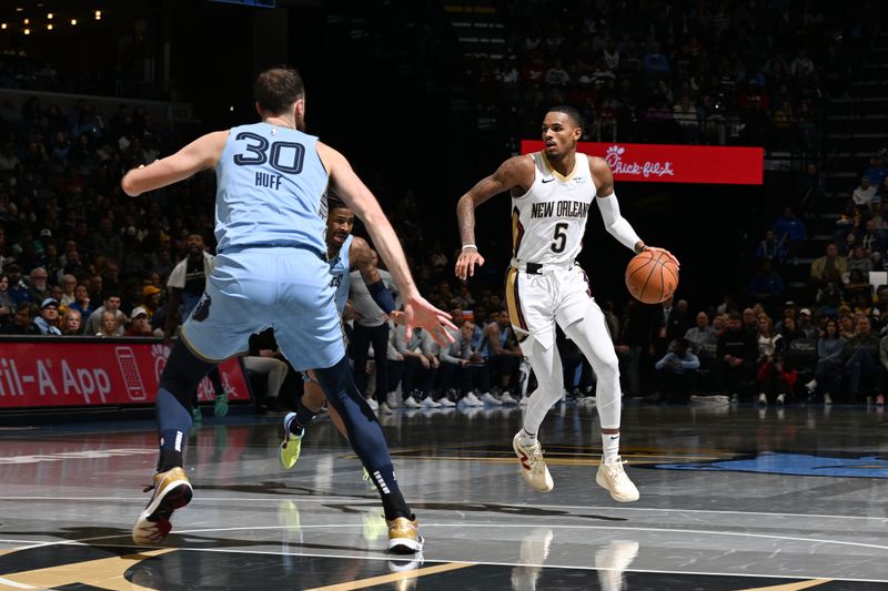 MEMPHIS, TN - NOVEMBER 29: Dejounte Murray #5 of the New Orleans Pelicans handles the ball during the game against the Memphis Grizzlies during the Emirates NBA Cup game on November 29, 2024 at FedExForum in Memphis, Tennessee. NOTE TO USER: User expressly acknowledges and agrees that, by downloading and or using this photograph, User is consenting to the terms and conditions of the Getty Images License Agreement. Mandatory Copyright Notice: Copyright 2024 NBAE (Photo by Grant Burke/NBAE via Getty Images)