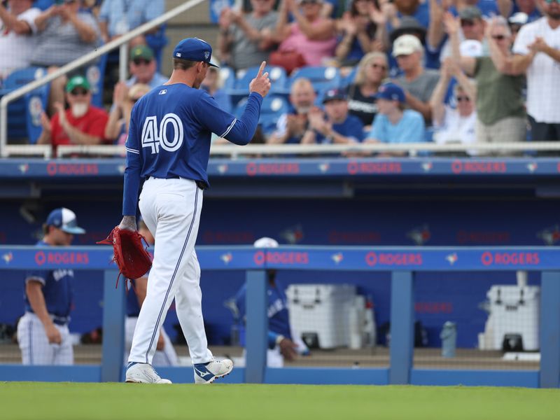 Mar 8, 2024; Dunedin, Florida, USA;  Toronto Blue Jays starting pitcher Chris Bassitt (40) leaves the game against the New York Yankees in the fifth inning at TD Ballpark. Mandatory Credit: Nathan Ray Seebeck-USA TODAY Sports