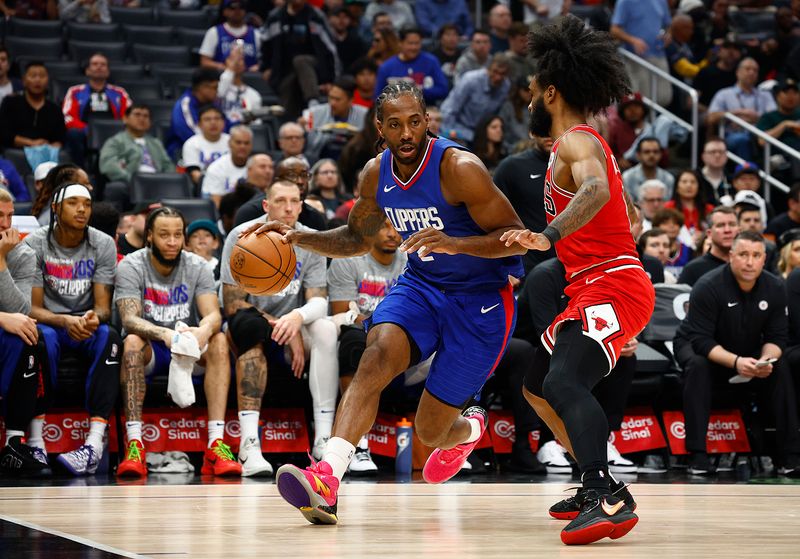 LOS ANGELES, CALIFORNIA - MARCH 09:  Kawhi Leonard #2 of the LA Clippers controls the ball against Coby White #0 of the Chicago Bulls in the second half at Crypto.com Arena on March 09, 2024 in Los Angeles, California.  NOTE TO USER: User expressly acknowledges and agrees that, by downloading and/or using this photograph, user is consenting to the terms and conditions of the Getty Images License Agreement.  (Photo by Ronald Martinez/Getty Images)