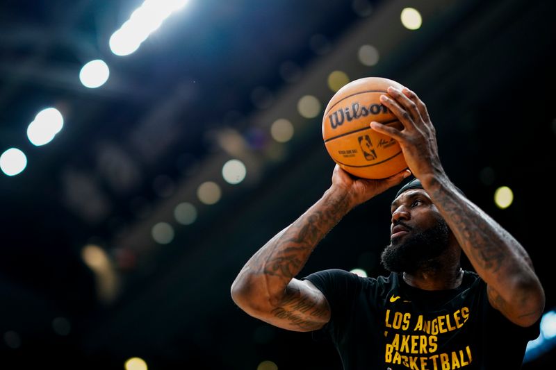 TORONTO, CANADA - APRIL 2: LeBron James #23 of the Los Angeles Lakers warms up before the game against the Toronto Raptors on April 2, 2024 at the Scotiabank Arena in Toronto, Ontario, Canada.  NOTE TO USER: User expressly acknowledges and agrees that, by downloading and or using this Photograph, user is consenting to the terms and conditions of the Getty Images License Agreement.  Mandatory Copyright Notice: Copyright 2024 NBAE (Photo by Mark Blinch/NBAE via Getty Images)