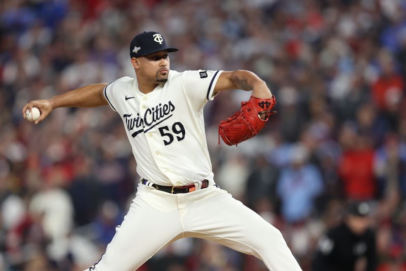 Oct 11, 2023; Minneapolis, Minnesota, USA; Minnesota Twins relief pitcher Jhoan Duran (59) pitches in the in the eighth inning against the Houston Astros during game four of the ALDS for the 2023 MLB playoffs at Target Field. Mandatory Credit: Jesse Johnson-USA TODAY Sports