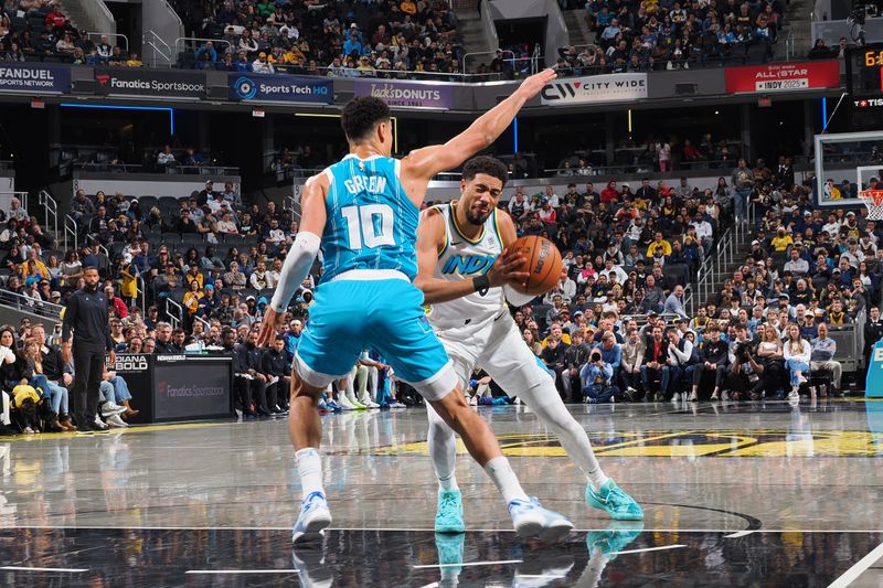 INDIANAPOLIS, IN - DECEMBER 8: Tyrese Haliburton #0 of the Indiana Pacers drives to the basket during the game against the Charlotte Hornets on December 8, 2024 at Gainbridge Fieldhouse in Indianapolis, Indiana. NOTE TO USER: User expressly acknowledges and agrees that, by downloading and or using this Photograph, user is consenting to the terms and conditions of the Getty Images License Agreement. Mandatory Copyright Notice: Copyright 2024 NBAE (Photo by Ron Hoskins/NBAE via Getty Images)