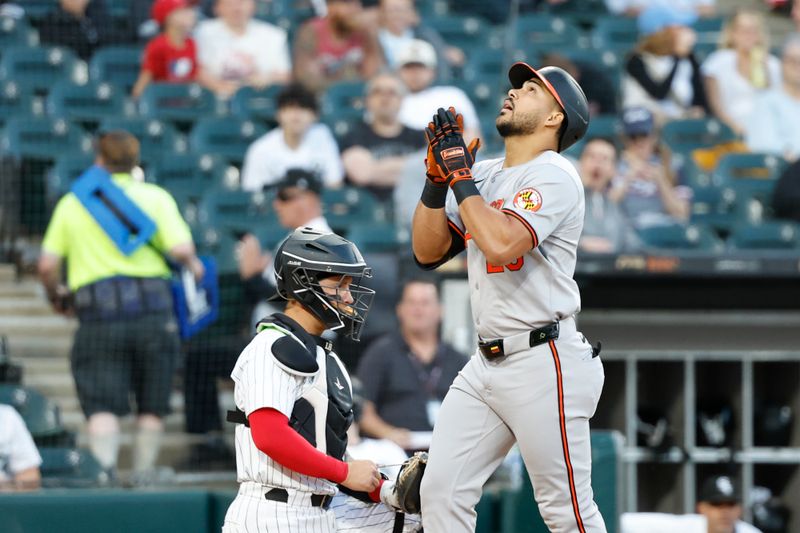 May 23, 2024; Chicago, Illinois, USA; Baltimore Orioles outfielder Anthony Santander (25) crosses home plate after hitting a solo home run against the Chicago White Sox during the fourth inning at Guaranteed Rate Field. Mandatory Credit: Kamil Krzaczynski-USA TODAY Sports