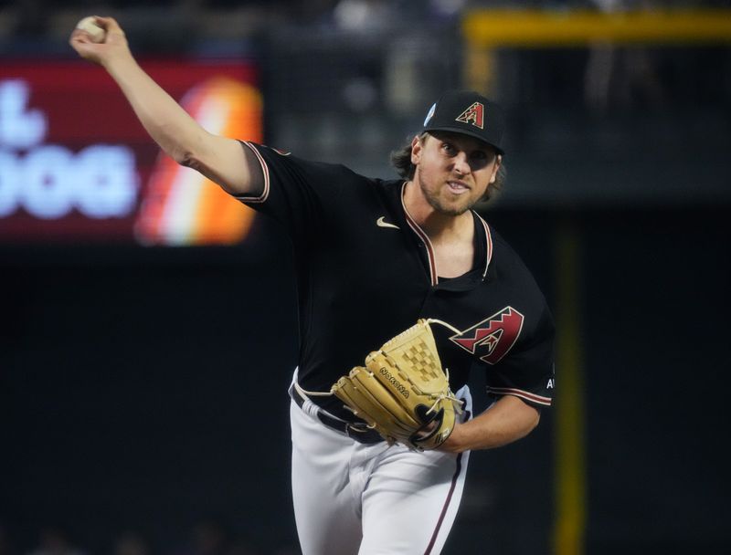 Jul 9, 2023; Phoenix, Arizona, USA;  Arizona Diamondbacks Kevin Ginkel (37) pitches in the seventh inning against the Pittsburgh Pirates at Chase Field. Mandatory Credit: Joe Rondone-USA TODAY Sports