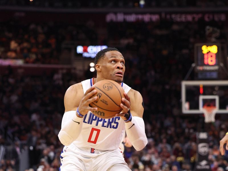 CLEVELAND, OH - JANUARY 29:  Russell Westbrook #0 of the LA Clippers handles the ball during the game  on January 29, 2024 at Rocket Mortgage FieldHouse in Cleveland, Ohio. NOTE TO USER: User expressly acknowledges and agrees that, by downloading and/or using this Photograph, user is consenting to the terms and conditions of the Getty Images License Agreement. Mandatory Copyright Notice: Copyright 2024 NBAE (Photo by  Lauren Leigh Bacho/NBAE via Getty Images)