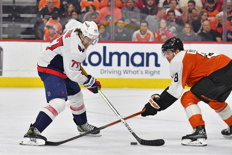 Apr 16, 2024; Philadelphia, Pennsylvania, USA; Washington Capitals right wing T.J. Oshie (77) controls the puck against Philadelphia Flyers defenseman Cam York (8) during the third period at Wells Fargo Center. Mandatory Credit: Eric Hartline-USA TODAY Sports