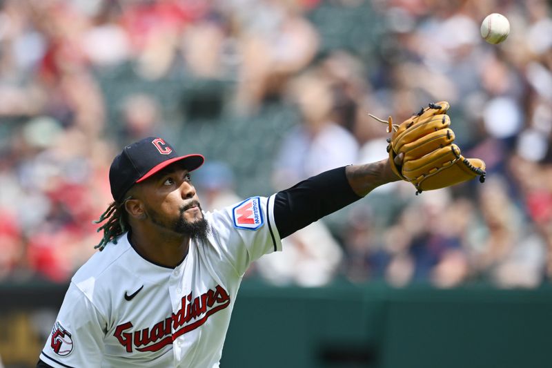 Aug 6, 2023; Cleveland, Ohio, USA; Cleveland Guardians relief pitcher Emmanuel Clase (48) fields a ball hit by Chicago White Sox designated hitter Eloy Jimenez (not pictured) during the ninth inning at Progressive Field. Jimenez was safe on the play. Mandatory Credit: Ken Blaze-USA TODAY Sports