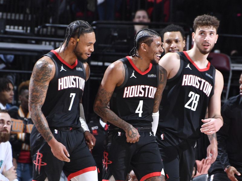 HOUSTON, TX - JANUARY 13:   Cam Whitmore #7, Jalen Green #4 and Alperen Sengun #28 of the Houston Rockets look on during the game against the Memphis Grizzlies on January 13, 2025 at the Toyota Center in Houston, Texas. NOTE TO USER: User expressly acknowledges and agrees that, by downloading and or using this photograph, User is consenting to the terms and conditions of the Getty Images License Agreement. Mandatory Copyright Notice: Copyright 2024 NBAE (Photo by Logan Riely/NBAE via Getty Images)