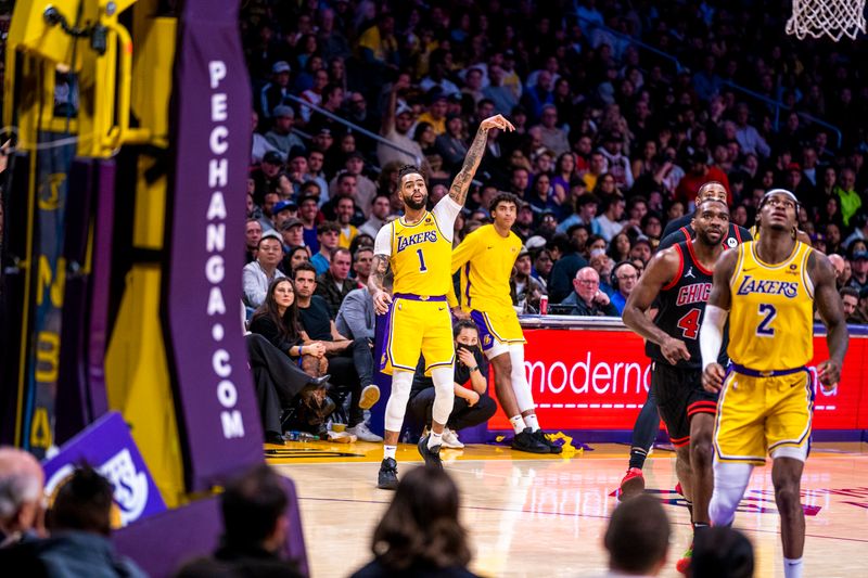 LOS ANGELES, CA - JANUARY 25: D'Angelo Russell #1 of the Los Angeles Lakers shoots a three point basket during the game against the Chicago Bulls on January 25, 2024 at Crypto.Com Arena in Los Angeles, California. NOTE TO USER: User expressly acknowledges and agrees that, by downloading and/or using this Photograph, user is consenting to the terms and conditions of the Getty Images License Agreement. Mandatory Copyright Notice: Copyright 2024 NBAE (Photo by Tyler Ross/NBAE via Getty Images)