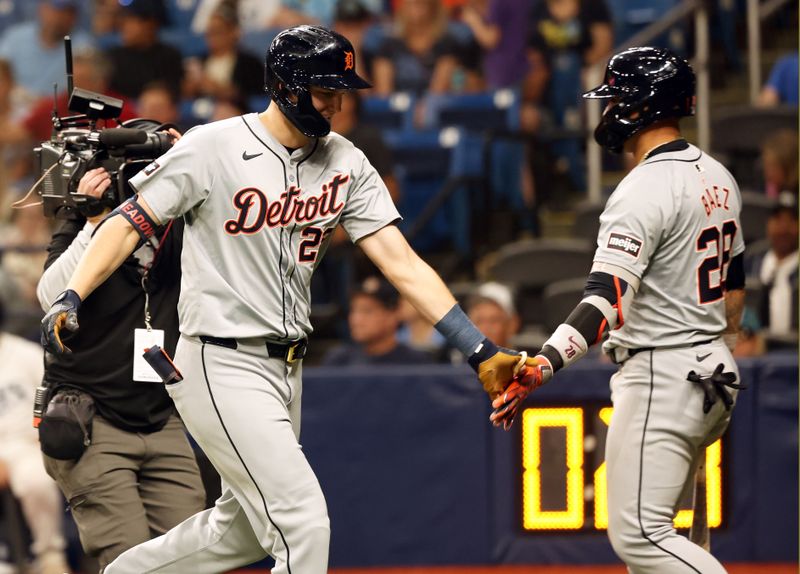 Apr 22, 2024; St. Petersburg, Florida, USA; Detroit Tigers outfielder Parker Meadows (22) is congratulated with shortstop Javier Báez (28) after he hit a home run against the Tampa Bay Rays against the Tampa Bay Rays  at Tropicana Field. Mandatory Credit: Kim Klement Neitzel-USA TODAY Sports