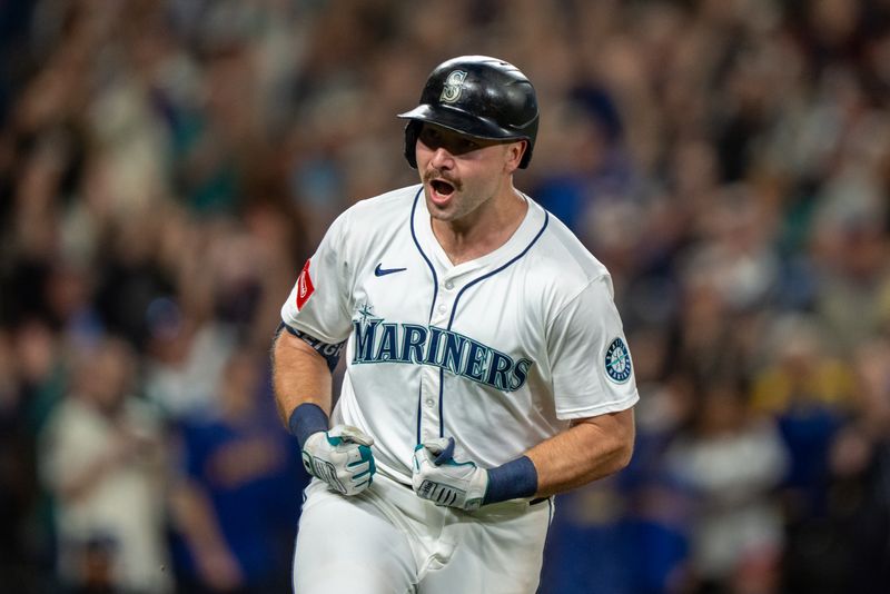Sep 24, 2025; Seattle, Washington, USA; Seattle Mariners catcher Cal Raleigh (29) celebrates after hitting a solo home run during the eighth inning against the Colorado Rockies at T-Mobile Park. Mandatory Credit: Stephen Brashear-Imagn Images