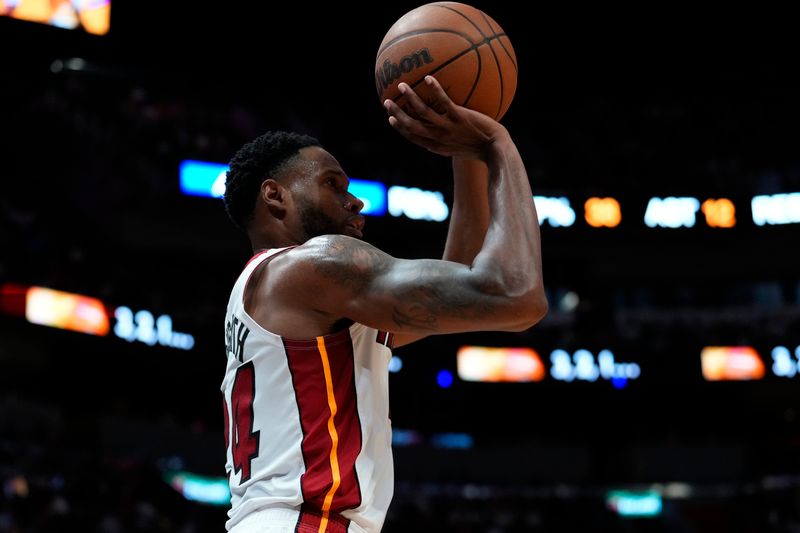 MIAMI, FLORIDA - APRIL 19: Haywood Highsmith #24 of the Miami Heat goes up for a shot against the Chicago Bulls in the second quarter during the Play-In Tournament at Kaseya Center on April 19, 2024 in Miami, Florida. NOTE TO USER: User expressly acknowledges and agrees that, by downloading and or using this photograph, User is consenting to the terms and conditions of the Getty Images License Agreement. (Photo by Rich Storry/Getty Images)