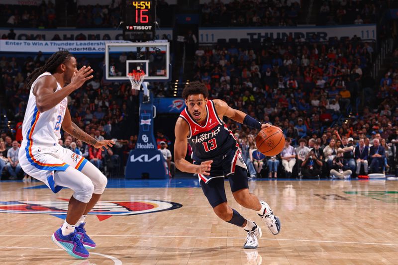 OKLAHOMA CITY, OK - FEBRUARY 23: Jordan Poole #13 of the Washington Wizards drives to the basket during the game against the Oklahoma City Thunder on February 23, 2024 at Paycom Arena in Oklahoma City, Oklahoma. NOTE TO USER: User expressly acknowledges and agrees that, by downloading and or using this photograph, User is consenting to the terms and conditions of the Getty Images License Agreement. Mandatory Copyright Notice: Copyright 2024 NBAE (Photo by Zach Beeker/NBAE via Getty Images)