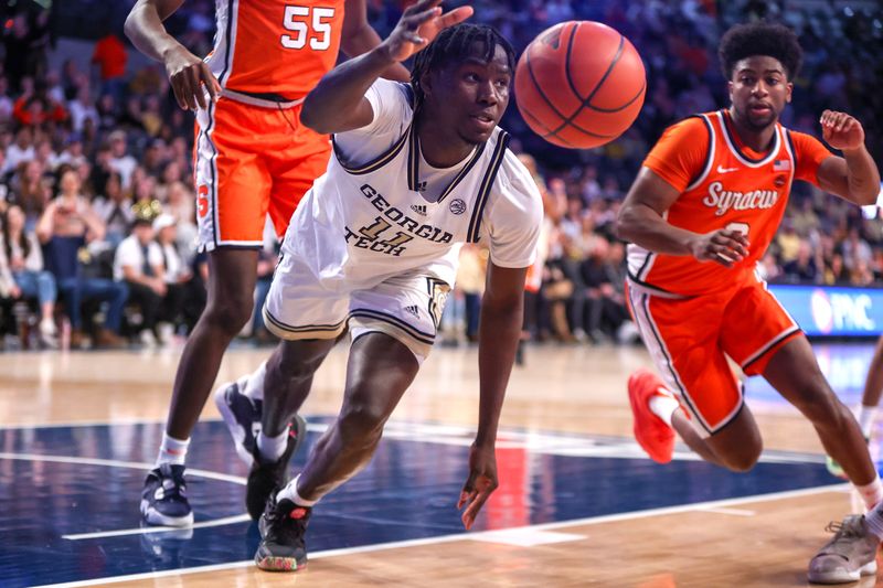 Feb 17, 2024; Atlanta, Georgia, USA; Georgia Tech Yellow Jackets forward Baye Ndongo (11) reaches for the ball against the Syracuse Orange in the second half at McCamish Pavilion. Mandatory Credit: Brett Davis-USA TODAY Sports
