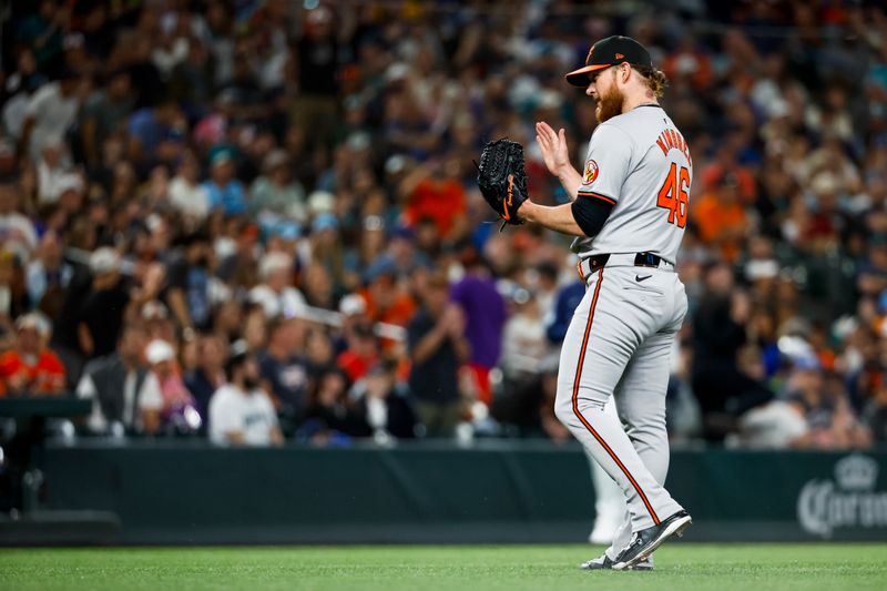 Jul 3, 2024; Seattle, Washington, USA; Baltimore Orioles relief pitcher Craig Kimbrel (46) reacts following a strikeout  against the Seattle Mariners during the ninth inning at T-Mobile Park. Mandatory Credit: Joe Nicholson-USA TODAY Sports