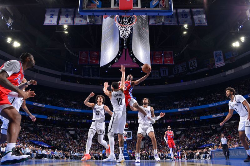 PHILADELPHIA, PA - NOVEMBER 22: Tyrese Maxey #0 of the Philadelphia 76ers drives to the basket during the game against the Brooklyn Nets during the Emirates NBA Cup game on November 22, 2024 at the Wells Fargo Center in Philadelphia, Pennsylvania NOTE TO USER: User expressly acknowledges and agrees that, by downloading and/or using this Photograph, user is consenting to the terms and conditions of the Getty Images License Agreement. Mandatory Copyright Notice: Copyright 2024 NBAE (Photo by Jesse D. Garrabrant/NBAE via Getty Images)