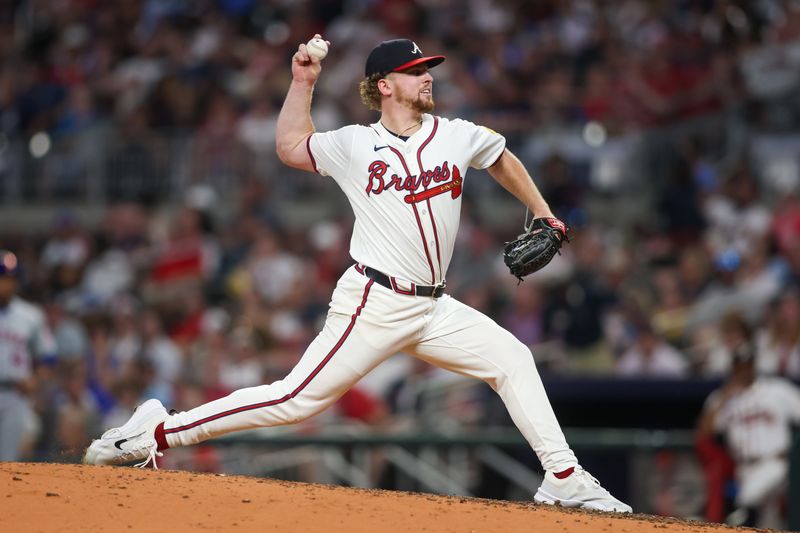 Sep 24, 2024; Atlanta, Georgia, USA; Atlanta Braves starting pitcher Spencer Schwellenbach (56) throws against the New York Mets in the seventh inning at Truist Park. Mandatory Credit: Brett Davis-Imagn Images
