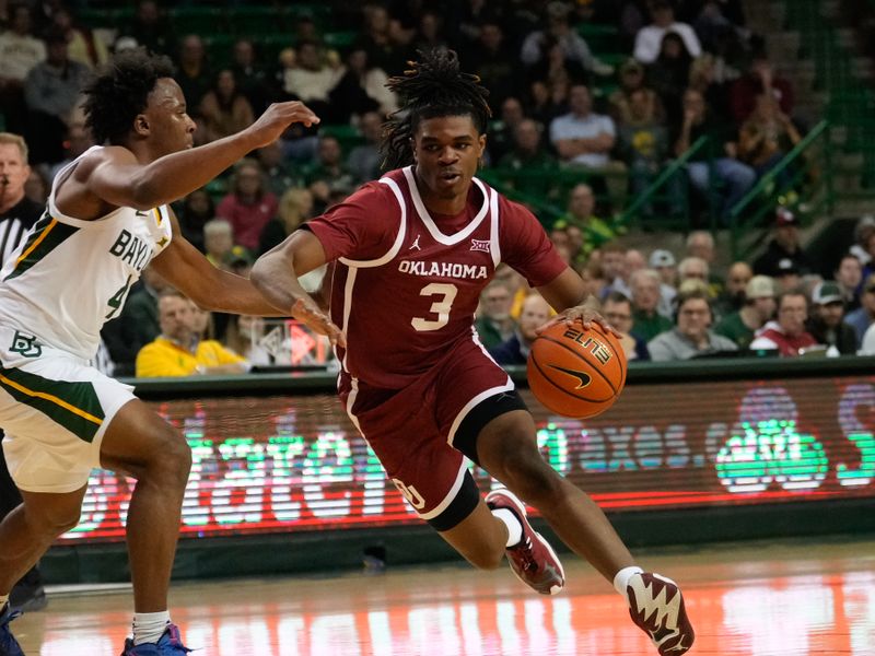 Feb 8, 2023; Waco, Texas, USA;  Oklahoma Sooners guard Otega Oweh (3) drives to the basket against Baylor Bears guard LJ Cryer (4) during the first half at Ferrell Center. Mandatory Credit: Chris Jones-USA TODAY Sports