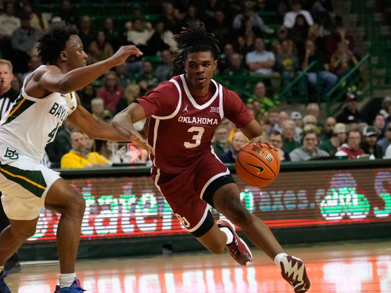 Feb 8, 2023; Waco, Texas, USA;  Oklahoma Sooners guard Otega Oweh (3) drives to the basket against Baylor Bears guard LJ Cryer (4) during the first half at Ferrell Center. Mandatory Credit: Chris Jones-USA TODAY Sports