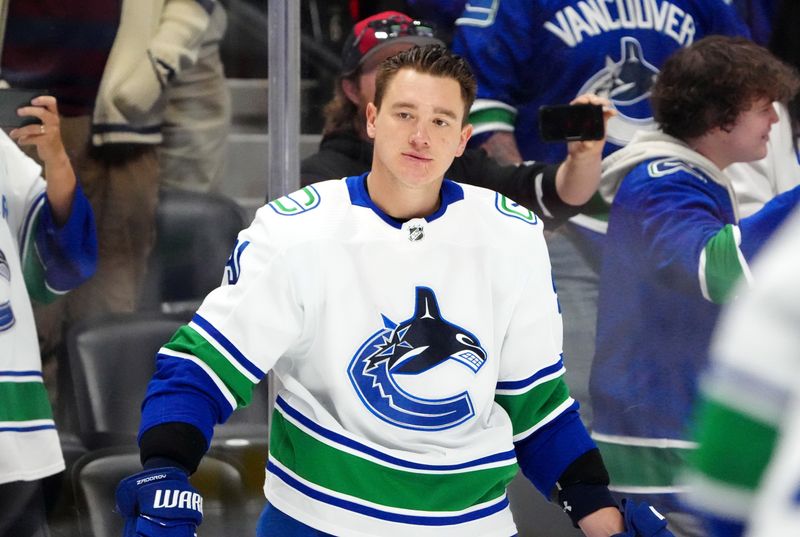 Feb 20, 2024; Denver, Colorado, USA; Vancouver Canucks defenseman Nikita Zadorov (91) before the game against the Colorado Avalanche at Ball Arena. Mandatory Credit: Ron Chenoy-USA TODAY Sports