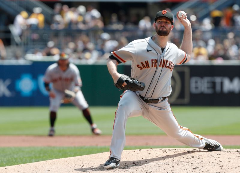 Jul 16, 2023; Pittsburgh, Pennsylvania, USA;  San Francisco Giants starting pitcher Alex Wood (57) delivers a pitch against the Pittsburgh Pirates during the first inning at PNC Park. Mandatory Credit: Charles LeClaire-USA TODAY Sports