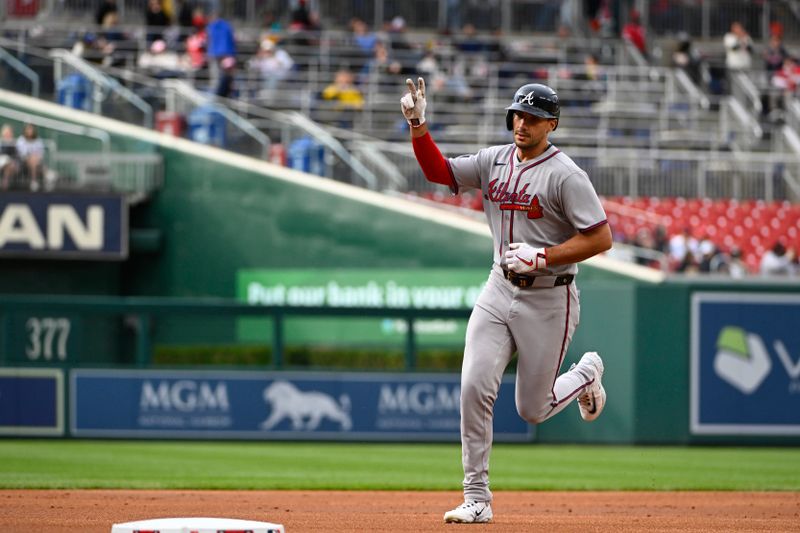 May 22, 2025; Washington, District of Columbia, USA; Atlanta Braves first base Matt Olson (28) gestures after hitting a solo home run against the Washington Nationals during the first inning at Nationals Park. Mandatory Credit: Brad Mills-Imagn Images