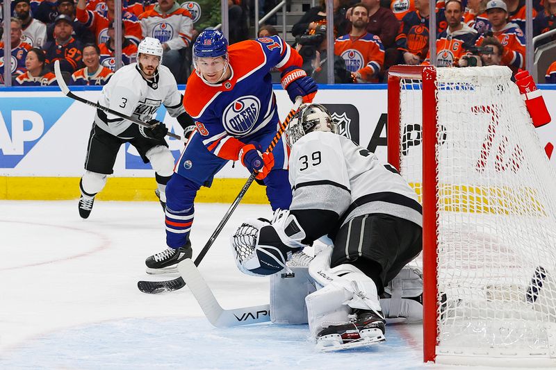 Apr 22, 2024; Edmonton, Alberta, CAN; Los Angeles Kings goaltender Cam Talbot (39) makes a save on Edmonton Oilers forward Zach Hyman (18) during the first period in game one of the first round of the 2024 Stanley Cup Playoffs at Rogers Place. Mandatory Credit: Perry Nelson-USA TODAY Sports